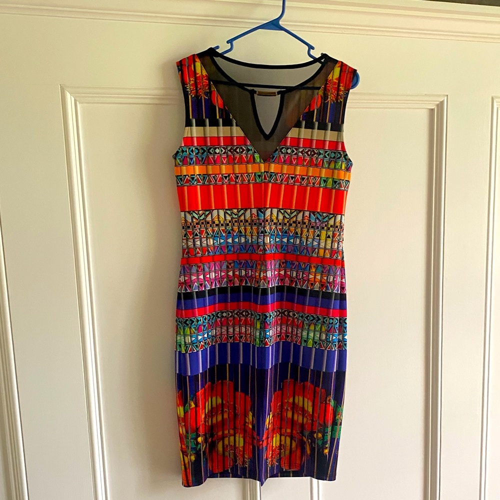 Joseph Ribkoff, size 12, multi color dress with neck embellishment.